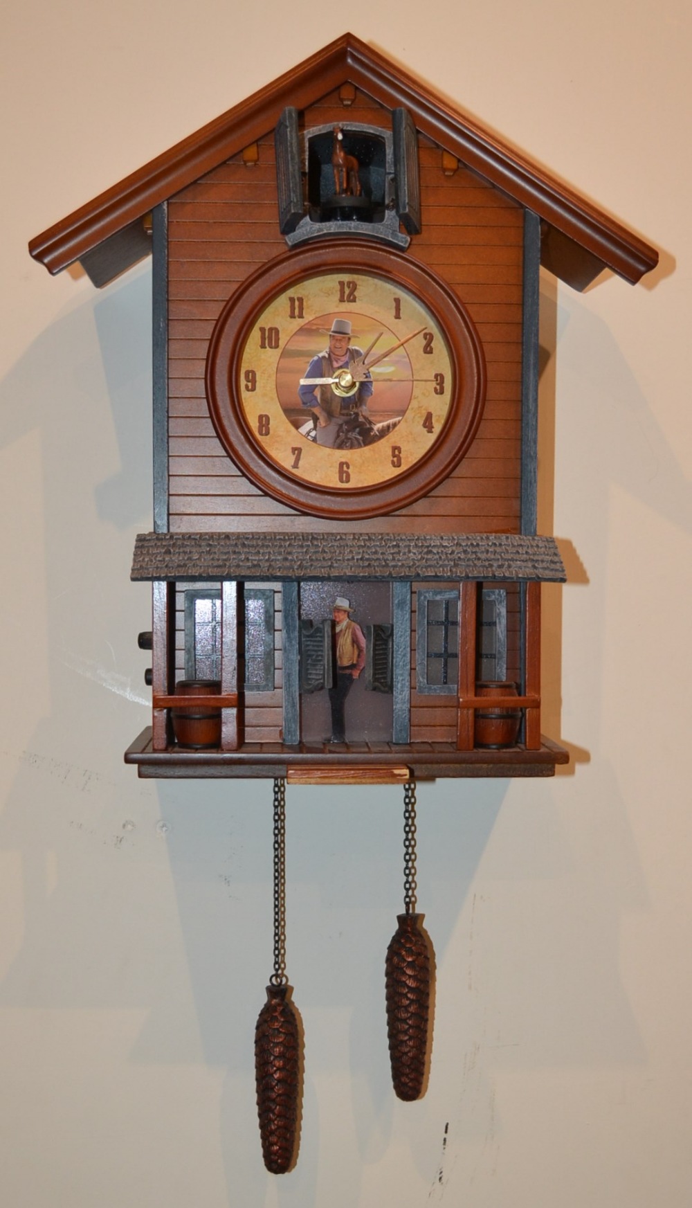 A Bradford exchange limited edition John Wayne American icon  cuckoo clock, serial No B2118, with