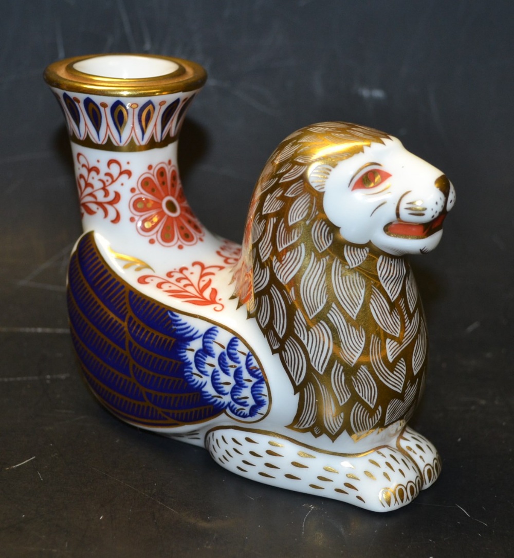 A Royal Crown Derby Imari palette winged Lion candlestick holder, unmarked, unboxed