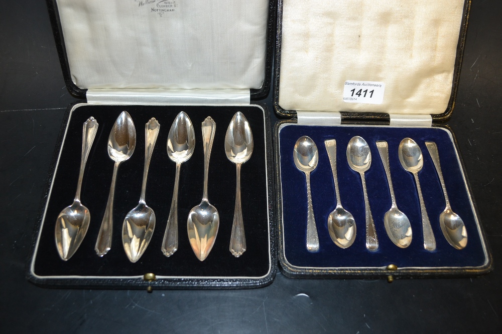 A set of six Art Deco silver grapefruit spoons, London 1931; a set of six silver teaspoons,
