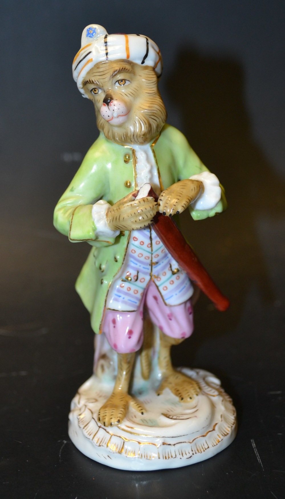 A German porcelain monkey model, Affenkammer, after a Meissen original