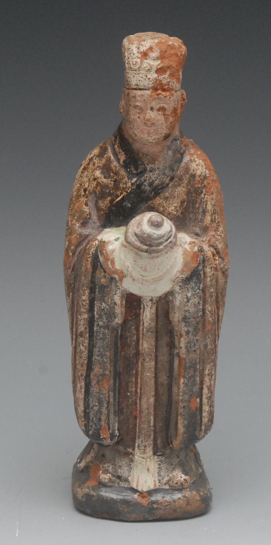 A Chinese terracotta tomb figure, polychrome glaze, 17cm high