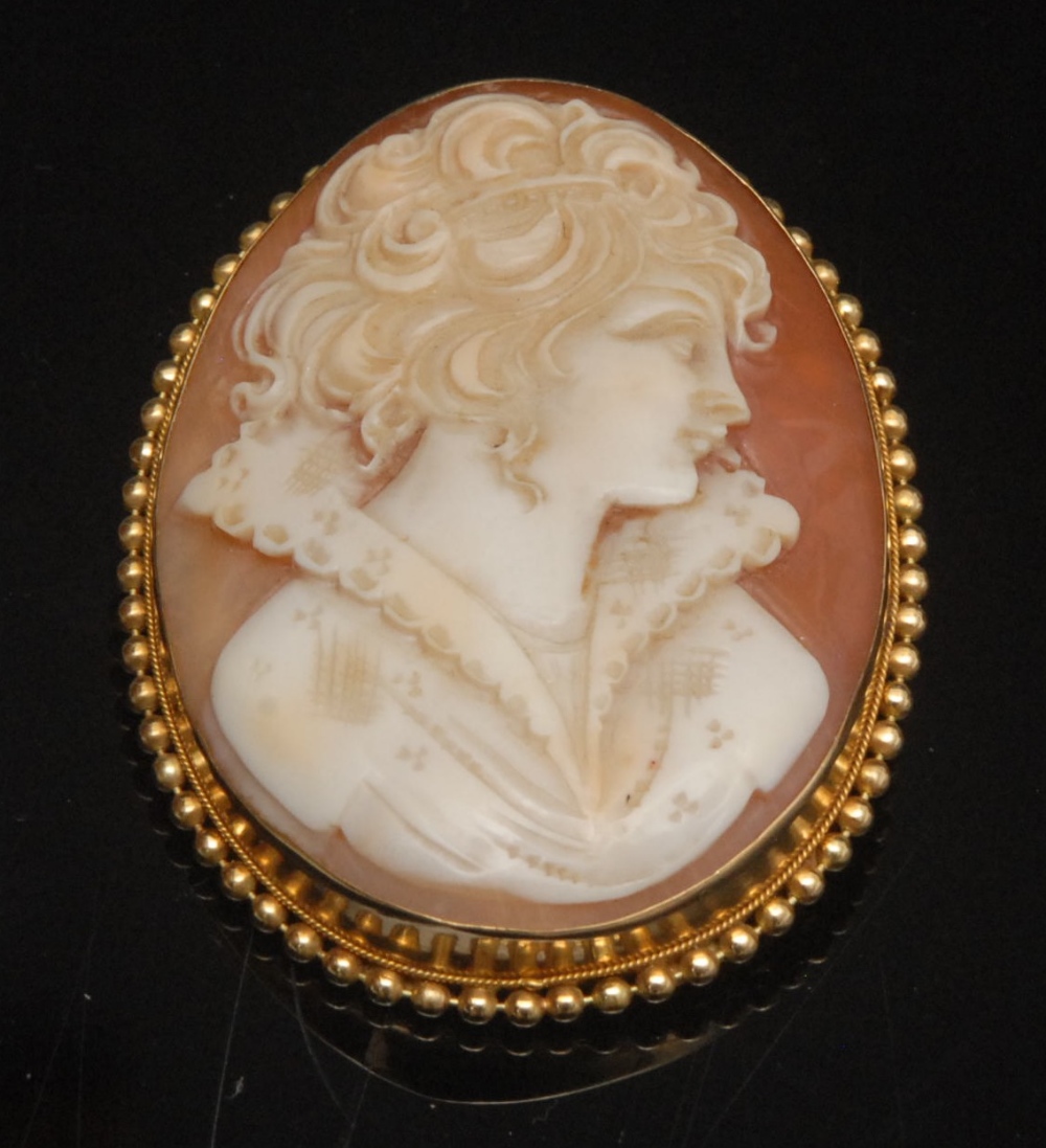 A 20th century Italian shell cameo brooch, Bust portrait of a girl facing right, 18ct gold beaded