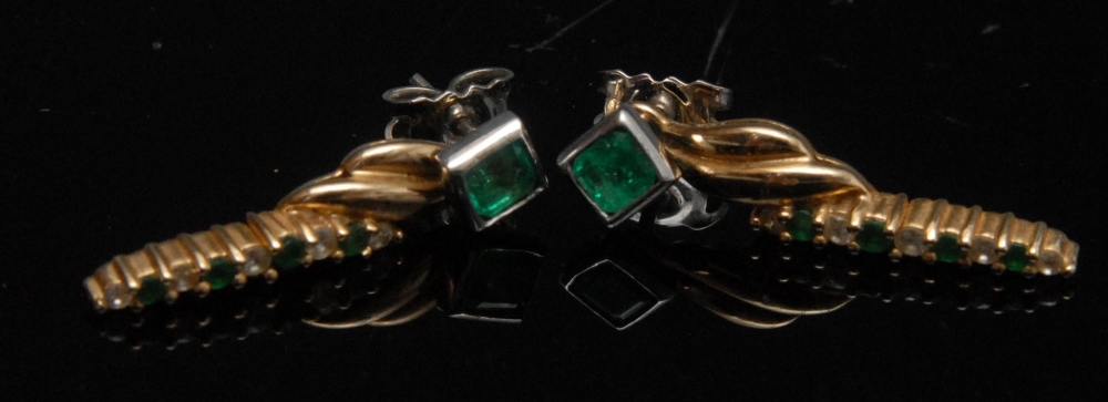 A pair of Colombian emerald and diamond earrings, square cut emerald, diamond set, suspending a