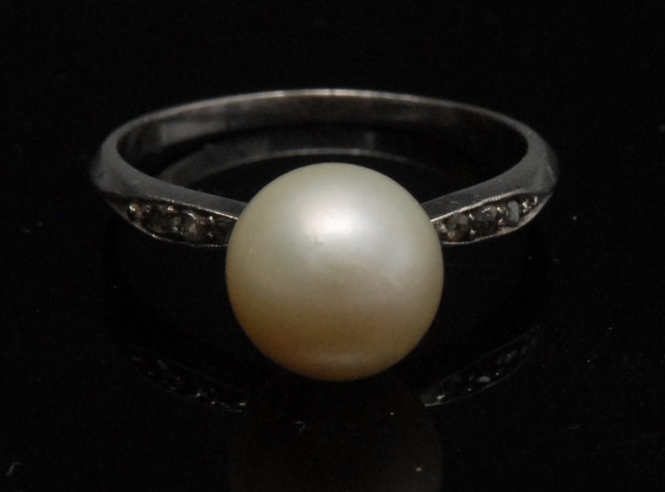 A mid-20th century diamond and cultured pearl ring, large single pearl, approx. 8mm diam, yellow