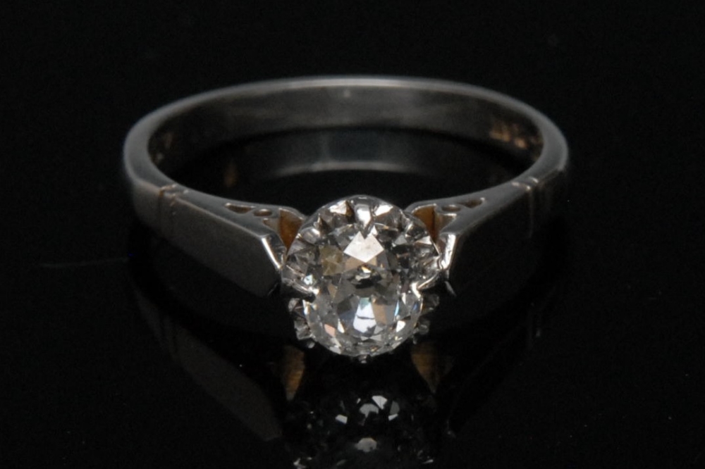 A diamond solitaire ring, oval brilliant cut diamond approx. 0.82ct, platinum claw set, 18ct white