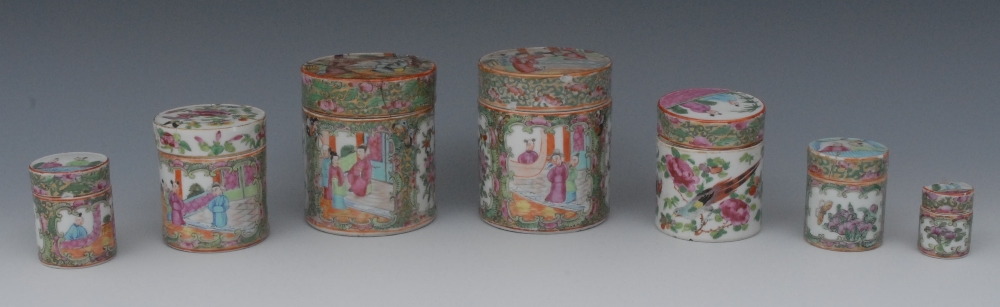 A Cantonese porcelain cylindrical jar and cover, painted in the Famille Verte palette with figures