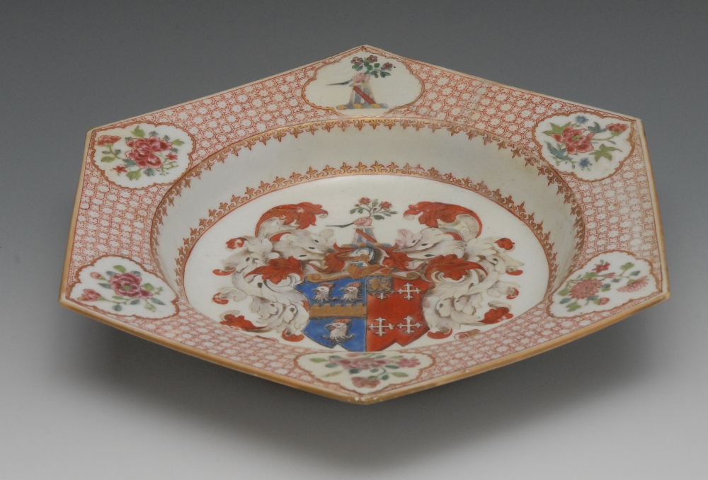 A Chinese armorial porcelain hexagonal dish, painted in the Famille Rose palette, the border with