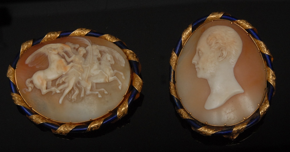 A 19th century shell cameo brooch,  allegorical scene of an angel and three horses, framed by an