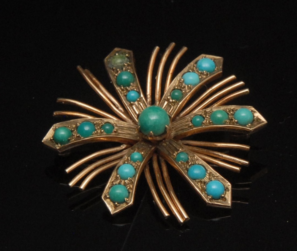 A 20th century turquoise flower brooch, central green turquoise cabochon surrounded by six arching