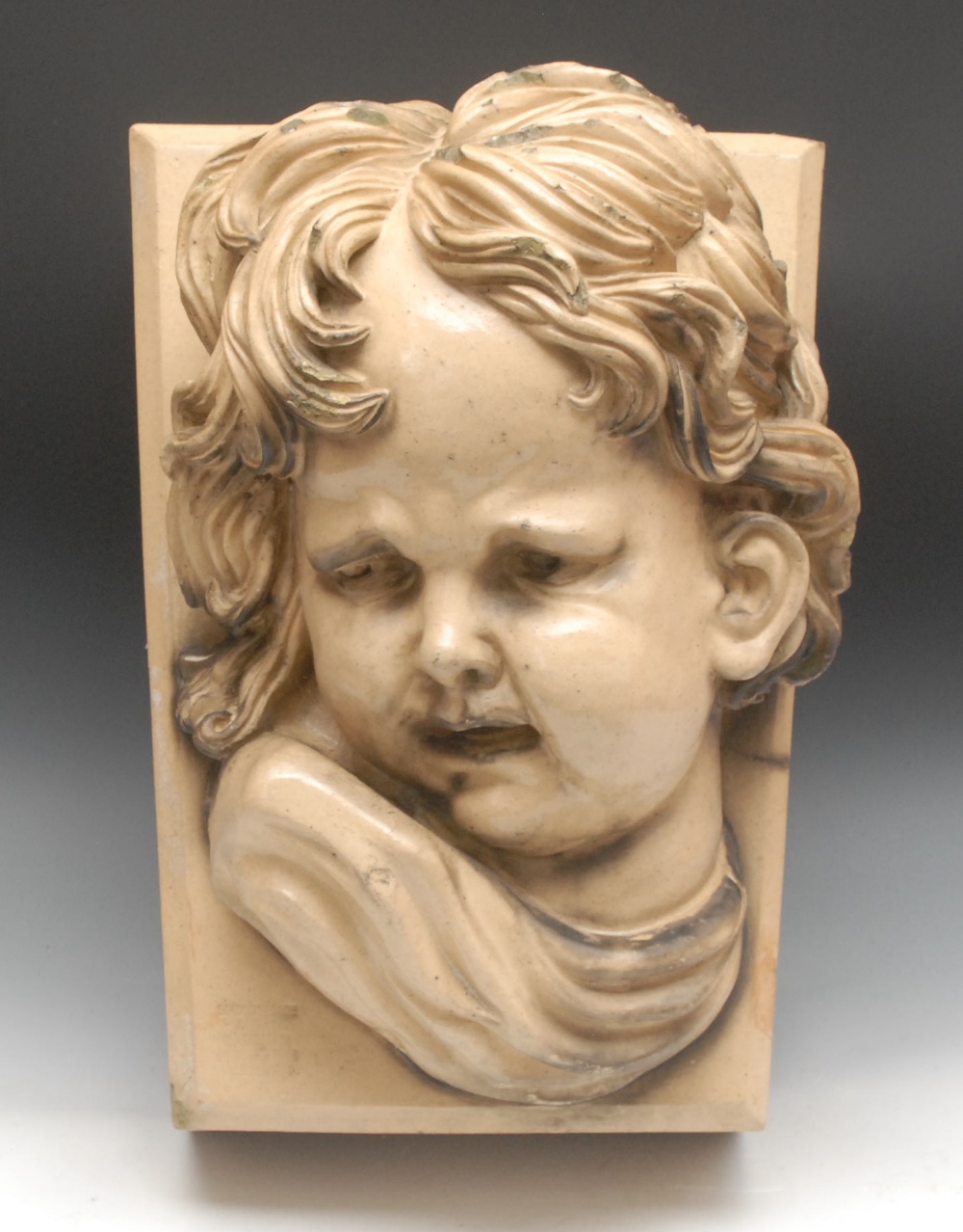A Frederick Lipscombe & Co Chesterfield patent glazed terracotta architectural corbel, modelled with