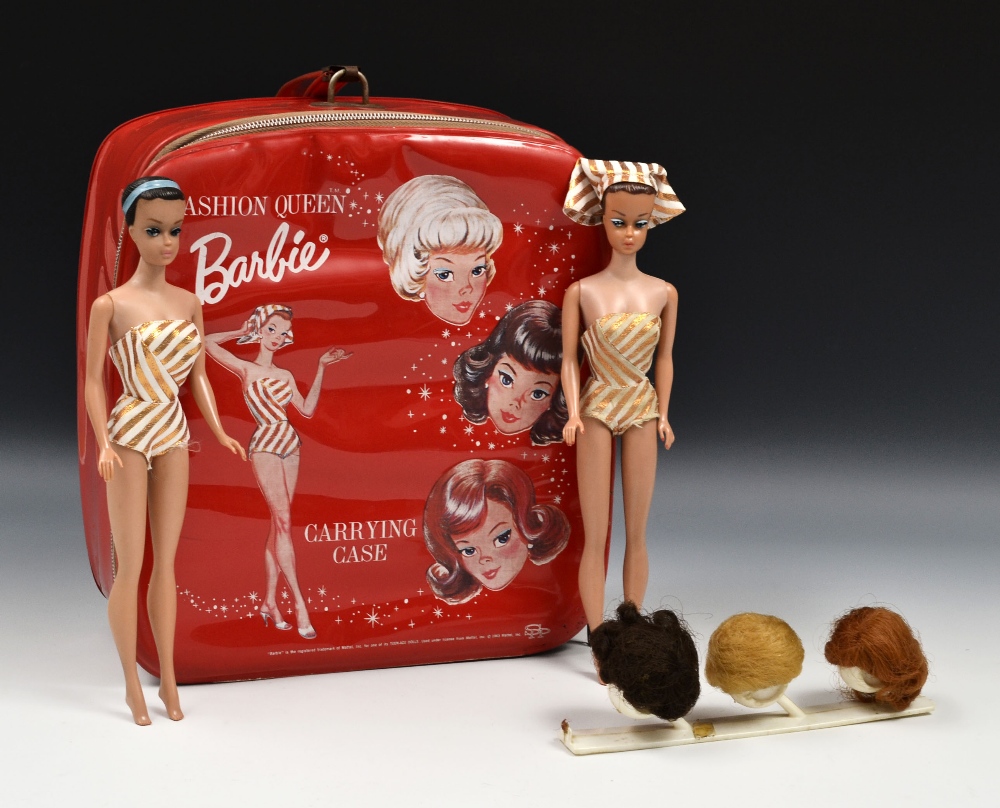 A Mattel Inc Fashion Queen Barbie rounded red vinyl carry case, red plastic handle, the front