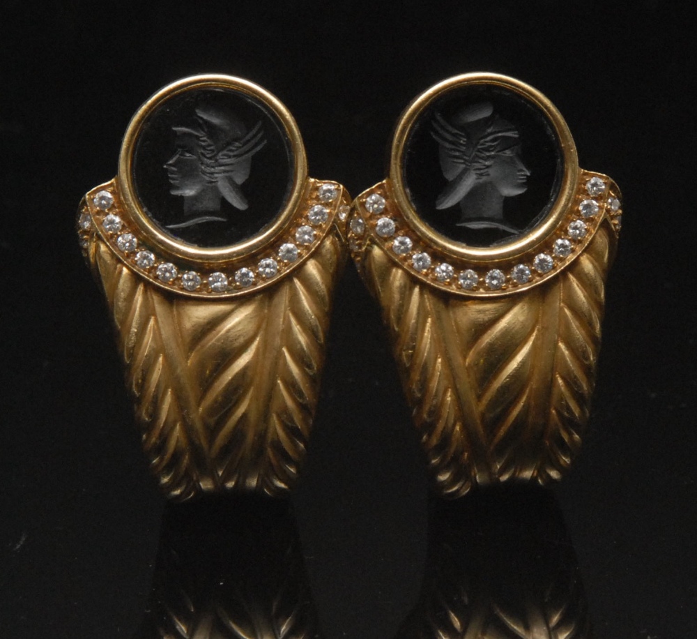 A pair of Luciano Tinelli diamond and intaglio earrings, circular intaglio bust of Purseus, above