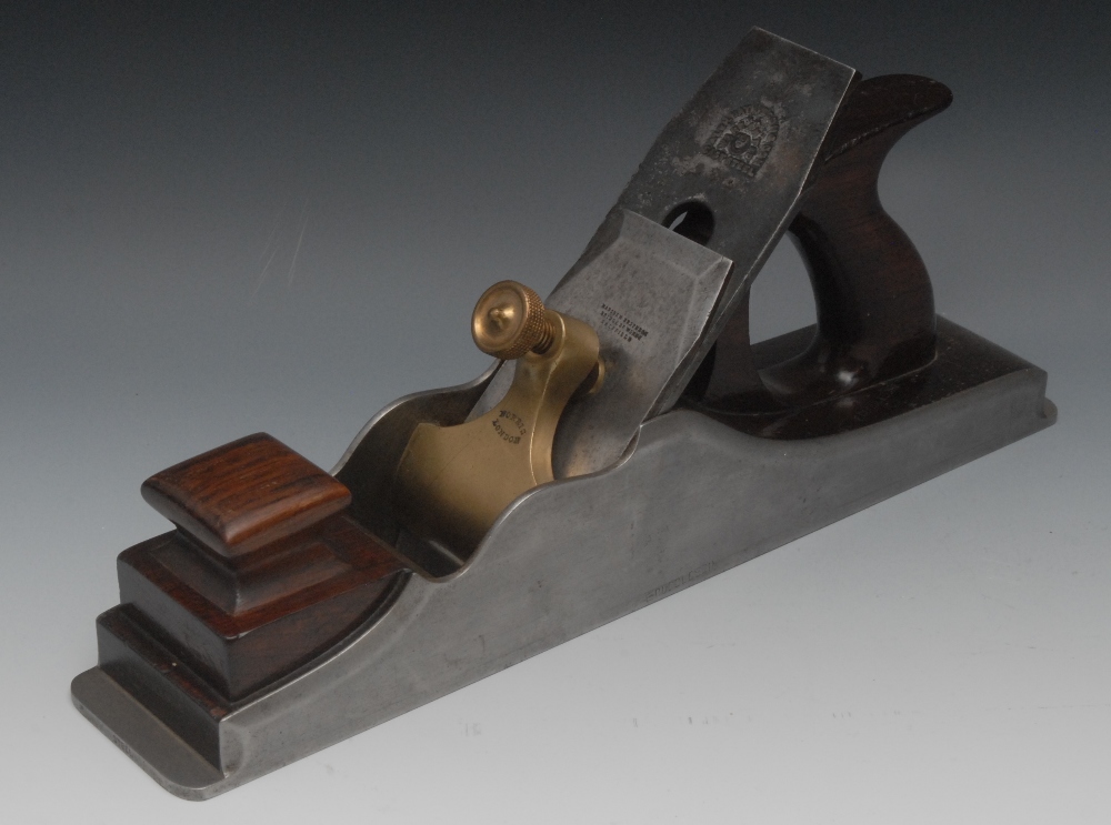 A 14 1/2" steel Norris No.1 dovetail panel plane, rosewood infill and handle, gunmetal lever cap