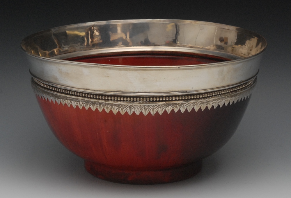 A large Bernard Moore silver mounted flambe punch bowl, glazed in tones of mottled red, 27.5cm diam,