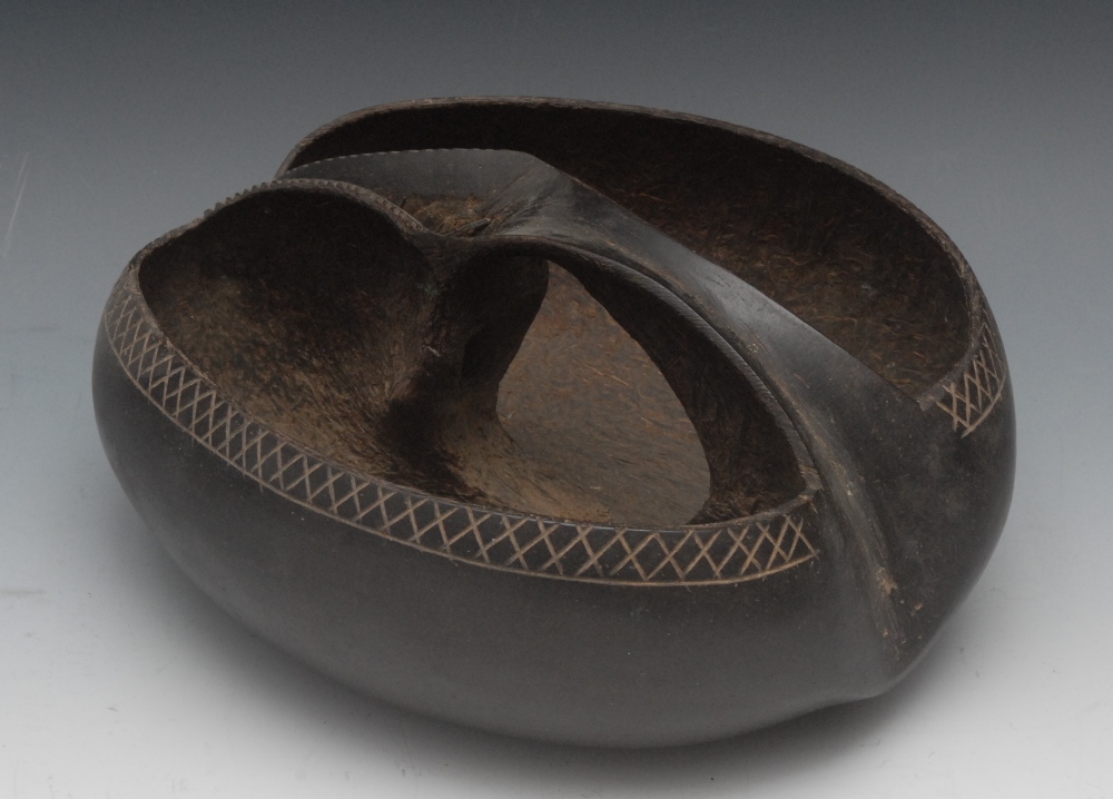 Treen/Natural History - a coco de mer (lodoicea maldivica) carved as a hand basket, the pierced