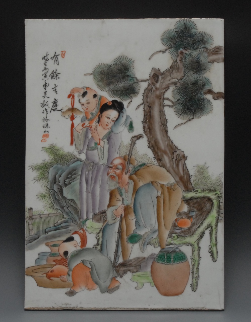 A Chinese porcelain rectangular panel, decorated with a mother and children with a wise elder beside