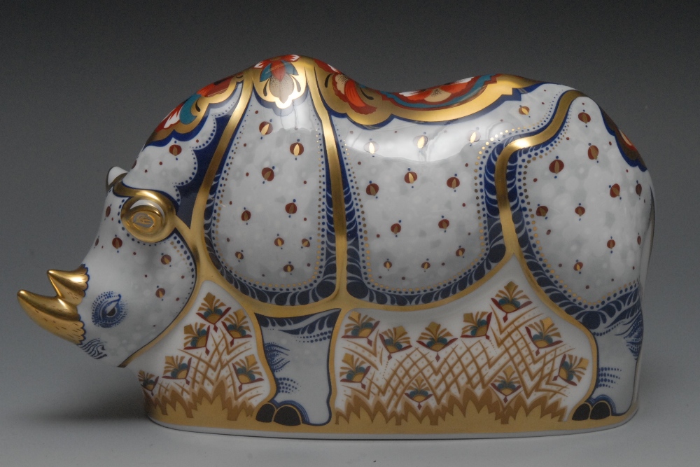 A Royal Crown Derby paperweight, Endangered Species White Rhino, commissioned by  Sinclairs, printed