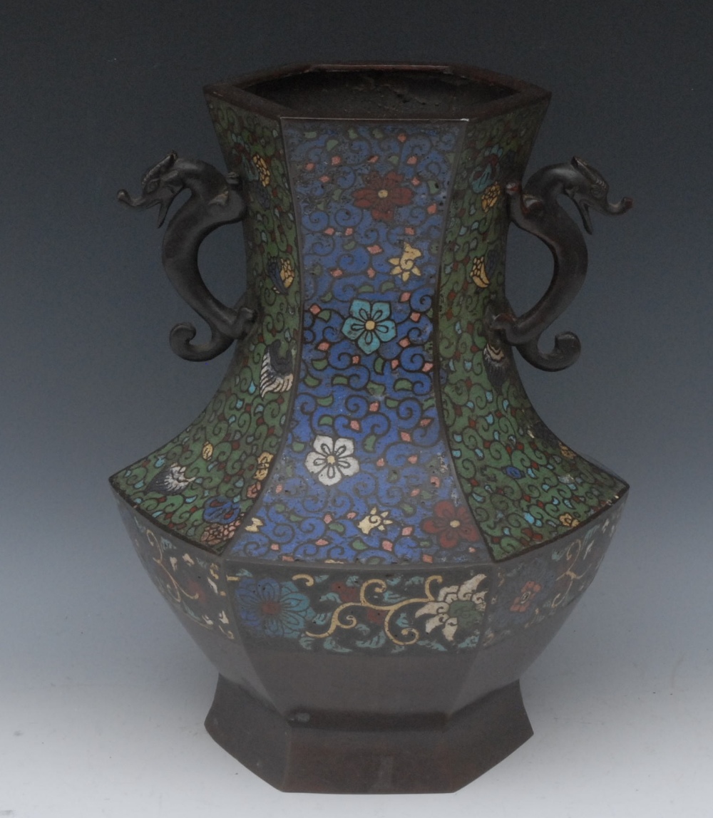 A Chinese champlevé enamel bronze vase, hexagonal shape, enamelled with flowers on a blue and