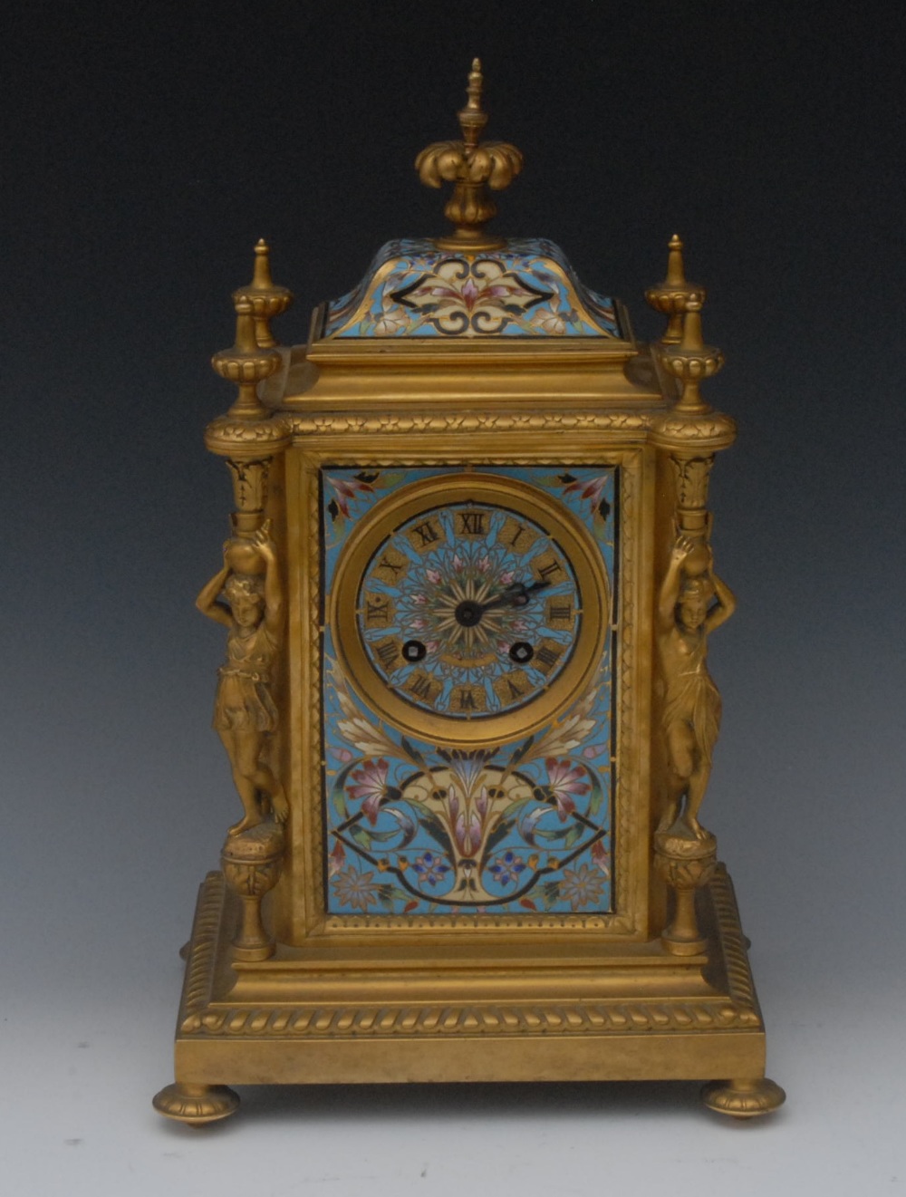 A  fine 19th century bronze and champleve enamel mantel clock, 8cm dial inscribed with Roman