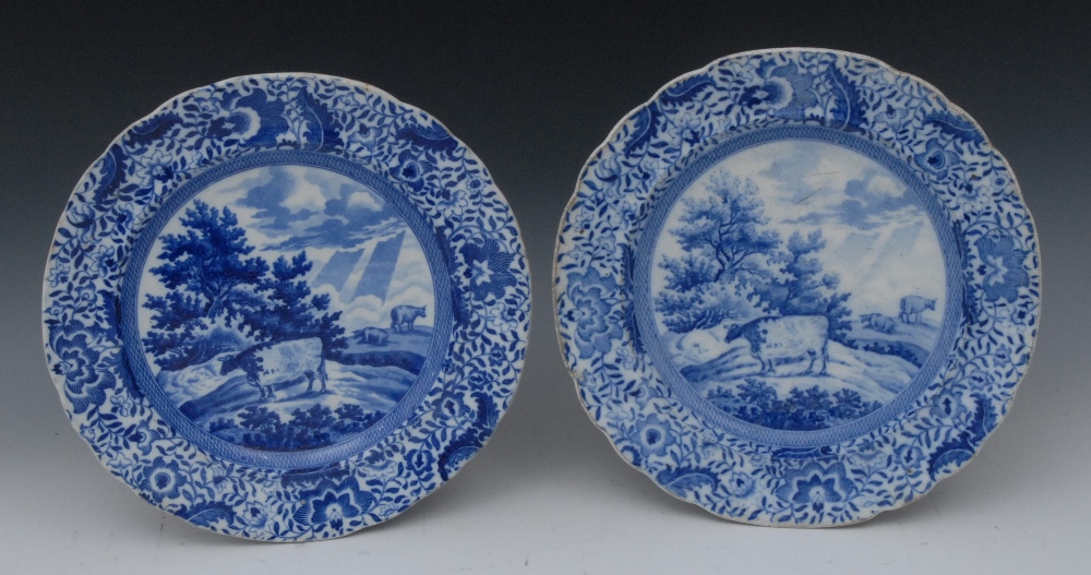 A pair of early 19th century Durham Ox  pattern shaped circular plates, printed in blue with an ox