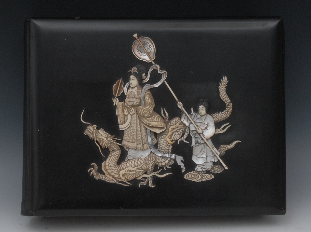 A Japanese shibayama album, the cover applied with deity riding a dragon and being fanned by