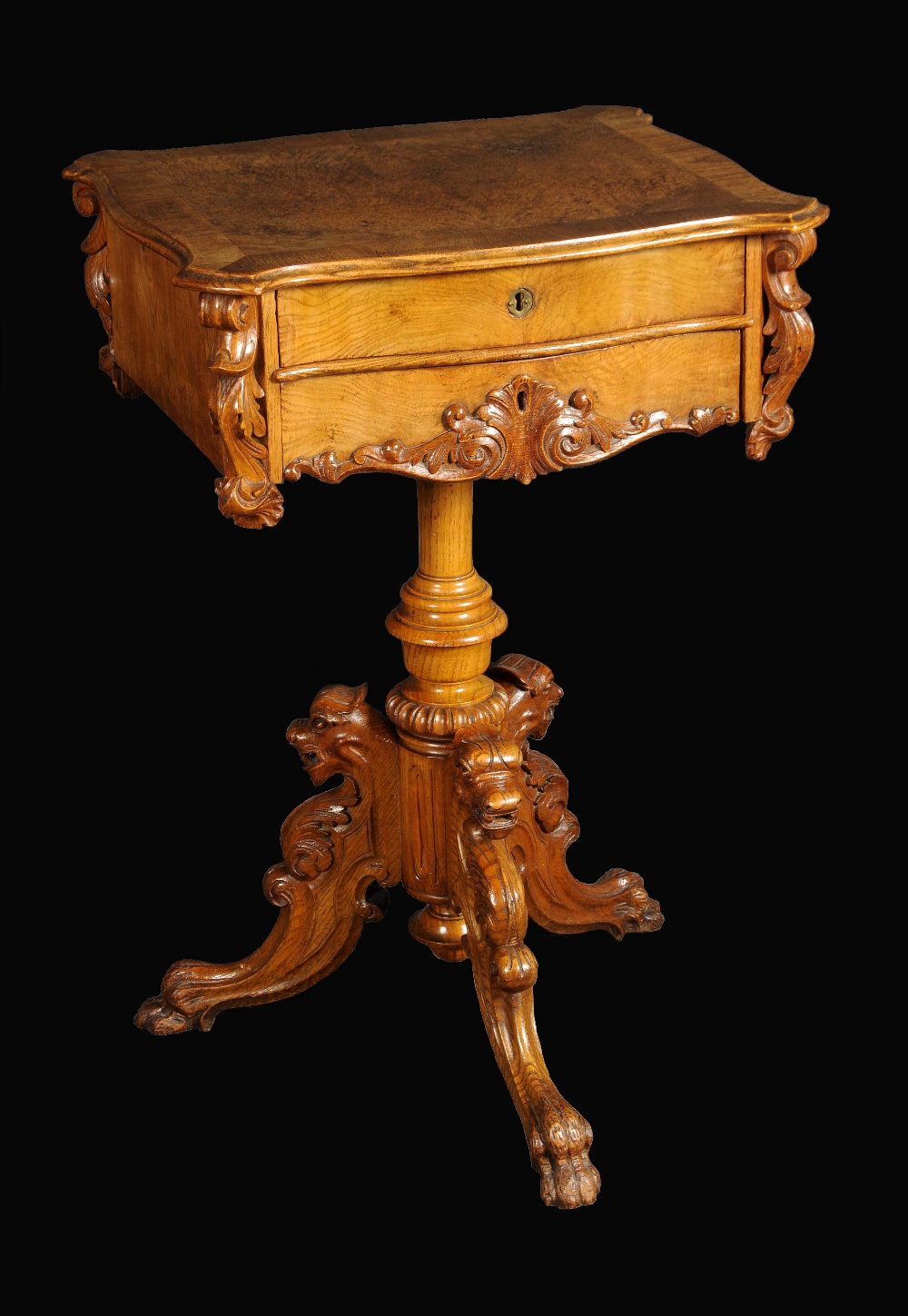 A 19th century pollard oak shaped rectangular work table, cross banded top with moulded edge above a