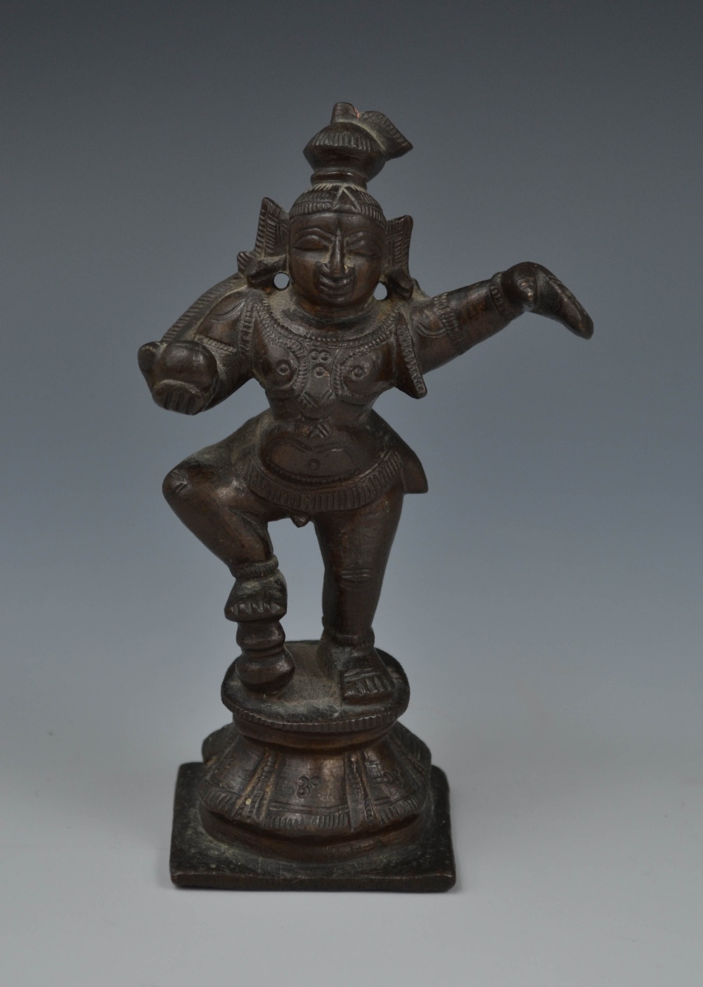 Indian School (19th century), a dark patinated bronze, of Lakshmi, square base,  10cm high.