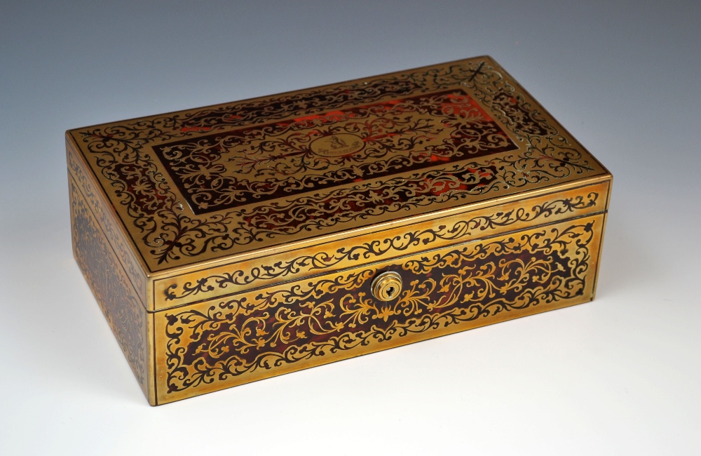 A substantial 19th century French Boulle work rectangular table cigar box, hinged cover centred by a