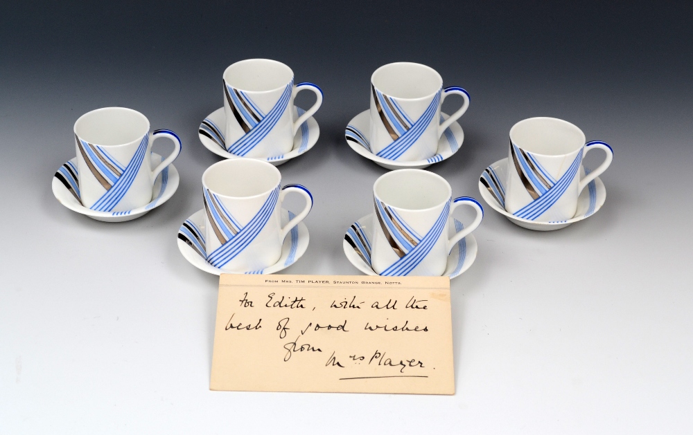 An Art Deco Foley China Mayfair coffee set for six, decorated with geometrical banding, printed