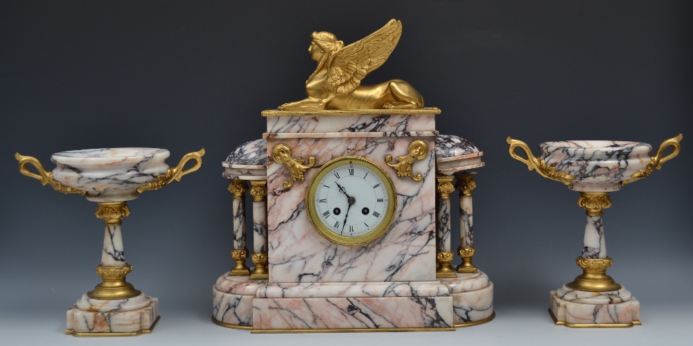 A late 19th century  marble clock garniture, 9cm enamelled dial, beaded gilt bezel, fourteen day