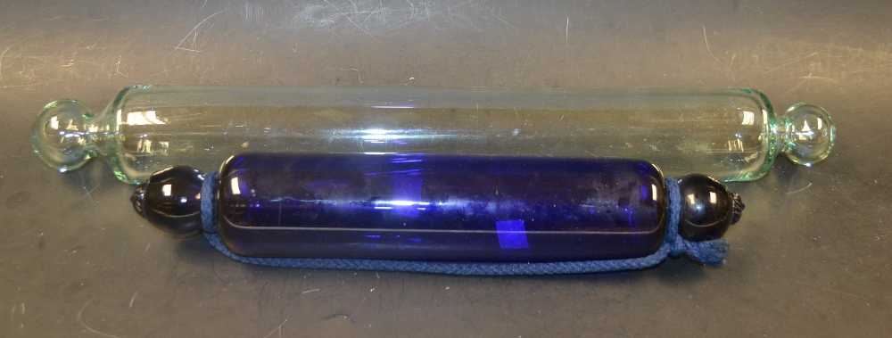 A Bristol blue glass rolling pin; another, clear glass rolling pin (2)