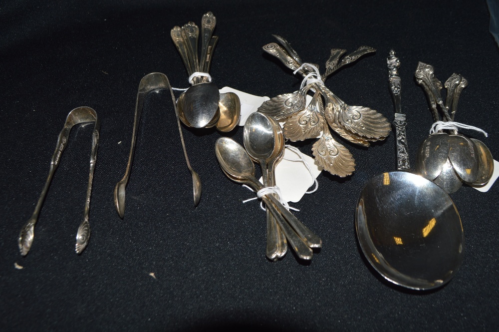 A set of Victorian silver coffee spoons, sugar nips, anointing spoon