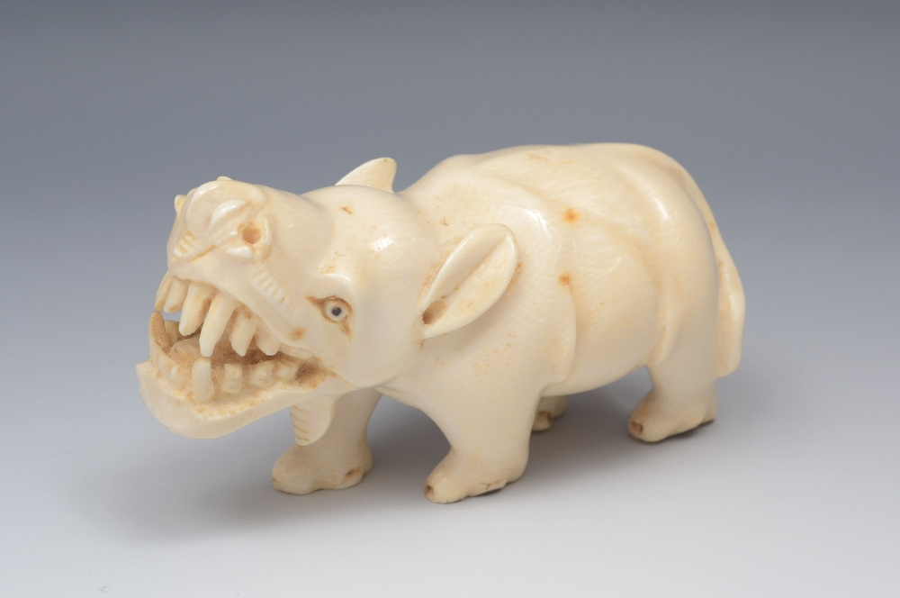 African School, early 20th century, an ivory hippopotamus, 12cm long