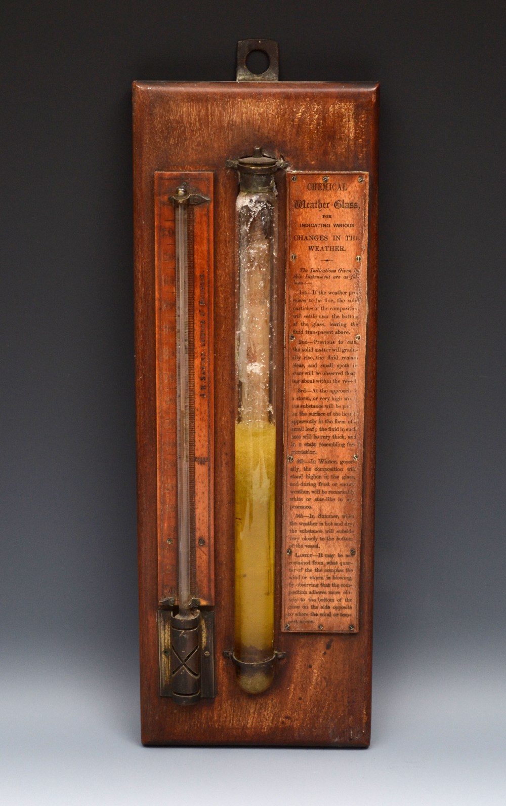 A 19th century chemical weather glass, 32cm cistern, mercury thermometer, instruction panel,