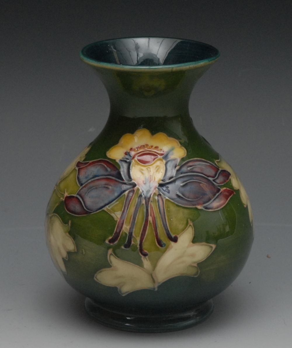 A Moorcroft Honeysuckle pattern ovoid vase, flared neck, tube lined with large flowers and foliage,