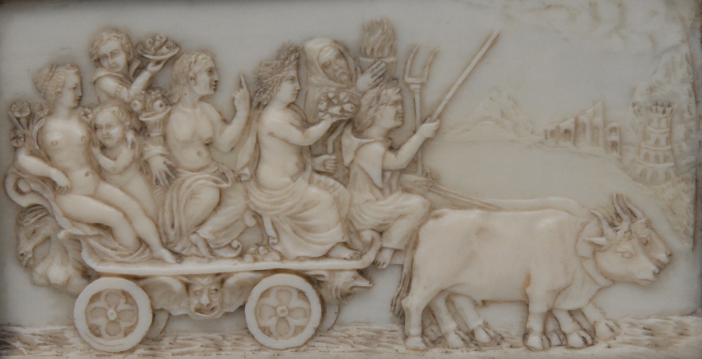 A 17th century European ivory rectangular panel, carved in relief with classical figures in an ox