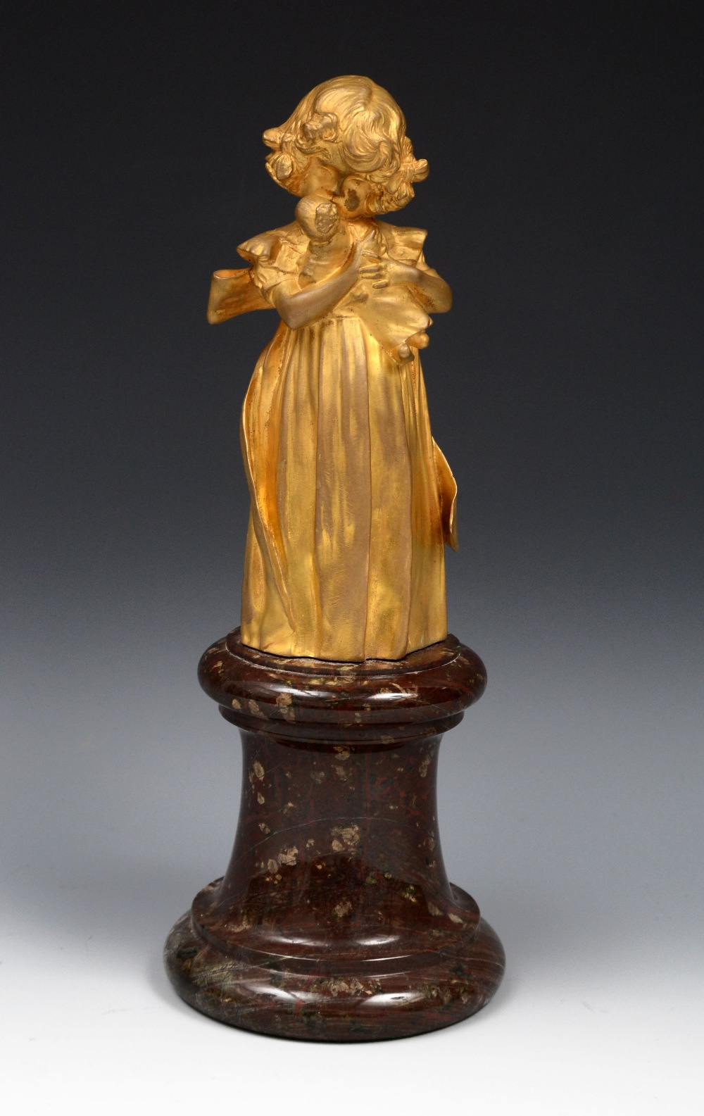 Leo Laporte Blairsy (1867 - 1923), a gilt bronze, Favourite Doll, signed in the maquette, turned