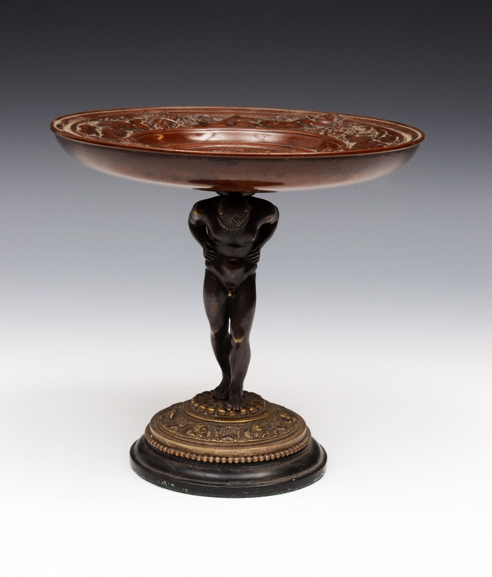 A 19th century dark patinated bronze and bronzed metal table centre comport, the circular plateau