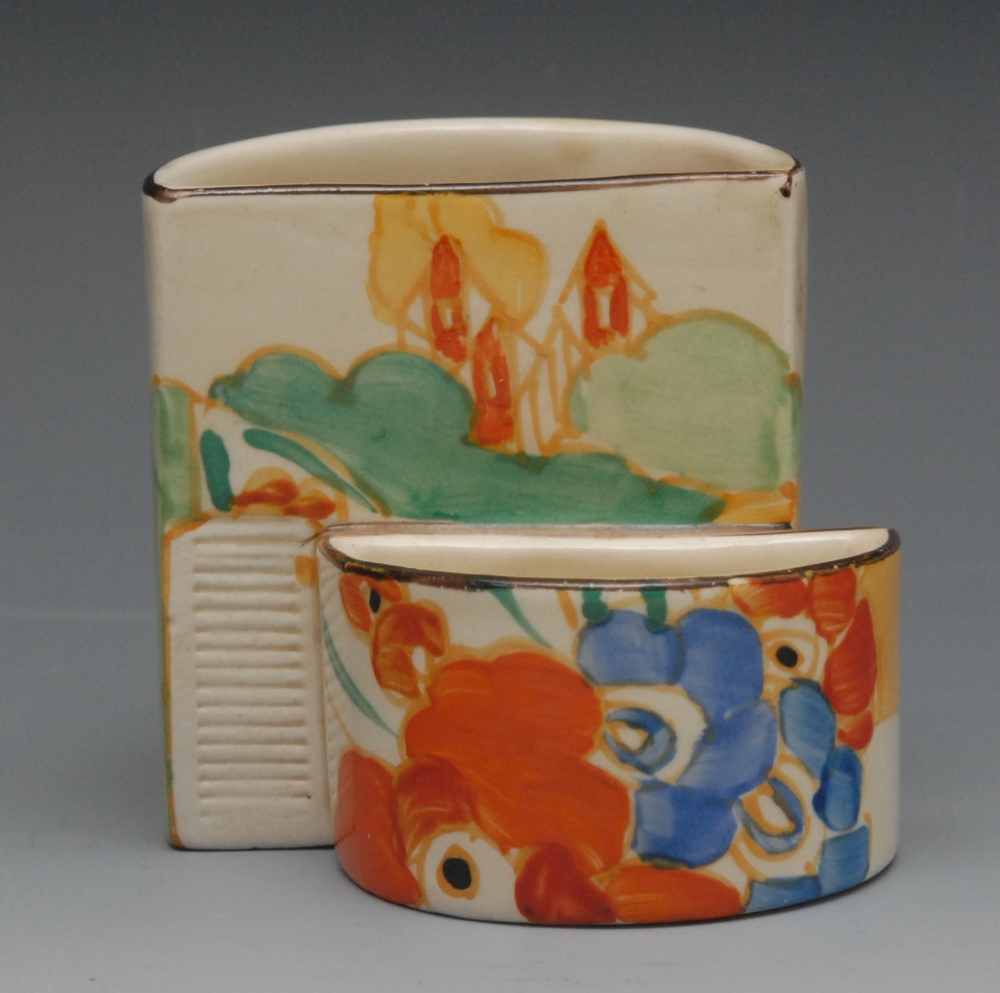 A Clarice Cliff Bizarre Alton pattern two-section match striker, brightly decorated with distant