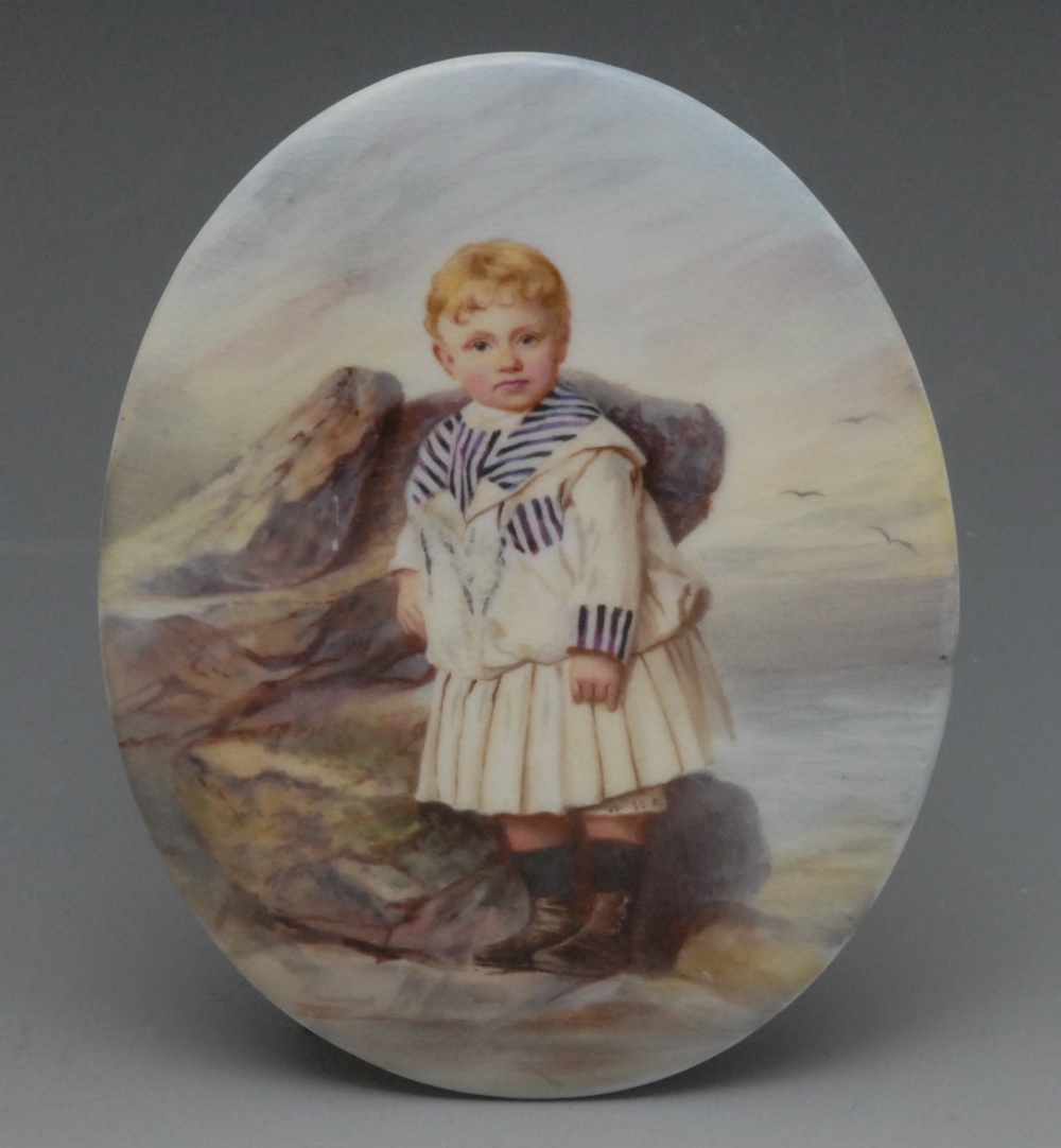 A Minton oval plaque, attributed to Boullemier, painted with Victorian child, in sailors dress,
