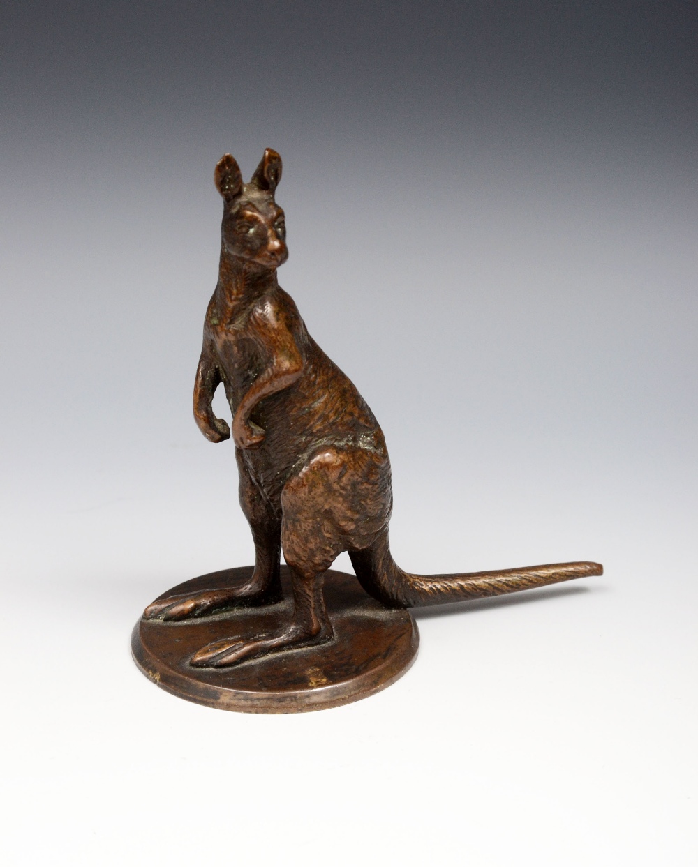 Austrian School (19th century), a dark patinated bronze, of a kangaroo, circular base, 11cm high