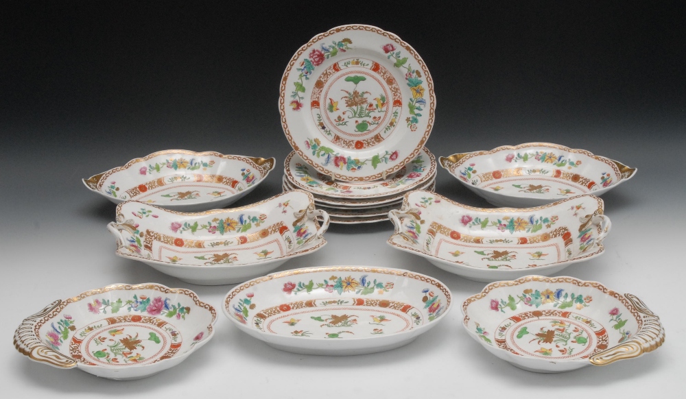 A Spode part service, pattern 2864, decorated with brightly enamelled Oriental flowers within gilt