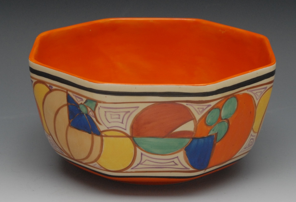 A Clarice Cliff Melon pattern octagonal bowl, brightly decorated with fruit and roundels, the