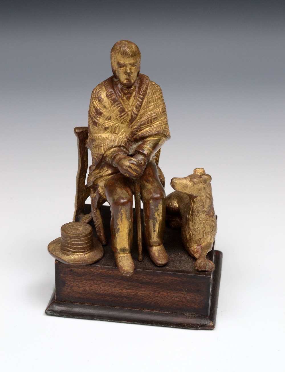 French School (19th Century), a gilt bronze, Faithful Friends, a farmer and his dog, 10cm high,