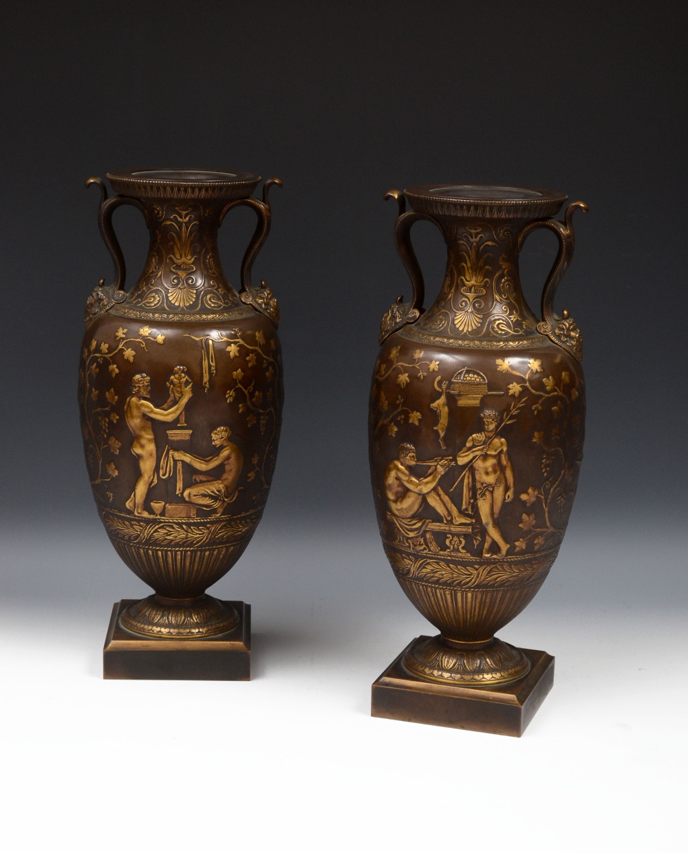 Ferdinand Levillain (1837 - 1905), a pair of fine brown and gilt patinated Etruscan two-handled