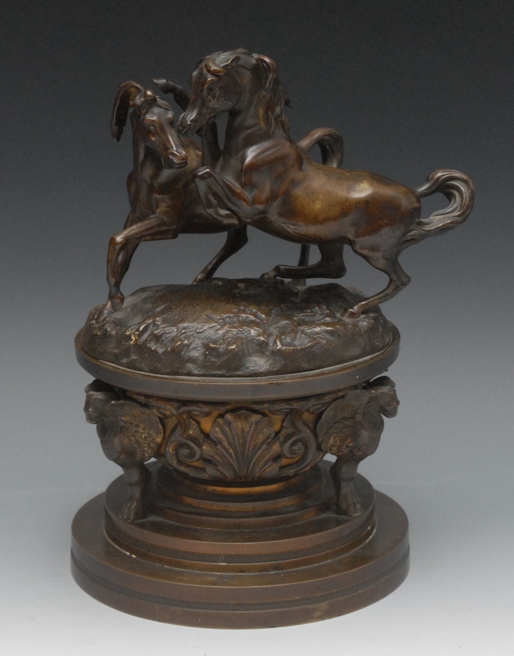 A 19th century French dark patinated bronze and ormolu classical revival country house inkwell/