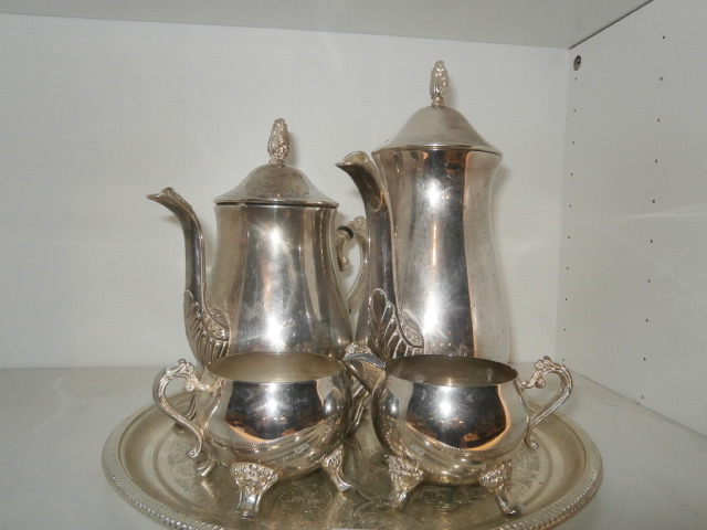 4 piece tea set on tray