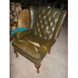 Green wing back chair for restoration