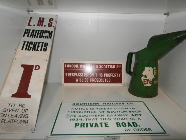 3 reproduction railway signs and an oil can