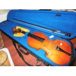 Cased violin